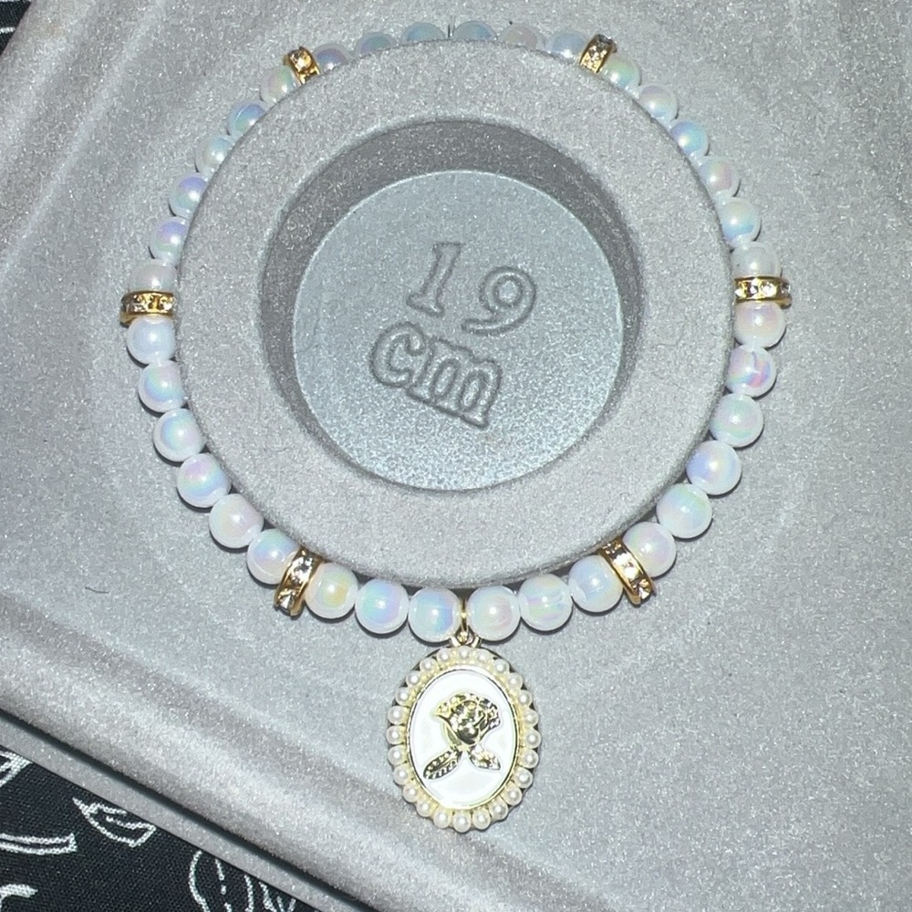 Elegant Gold and White Beaded Bracelet